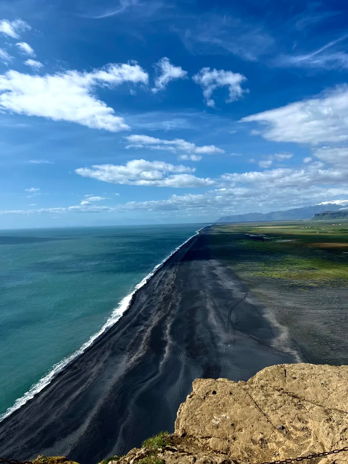 Endless black sand beach view
